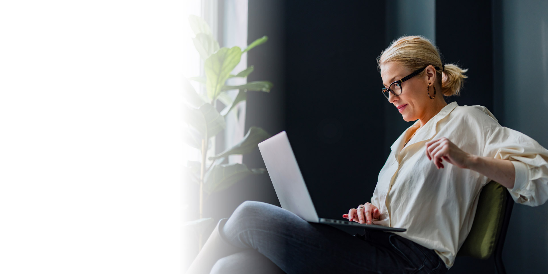 A woman working on her laptop