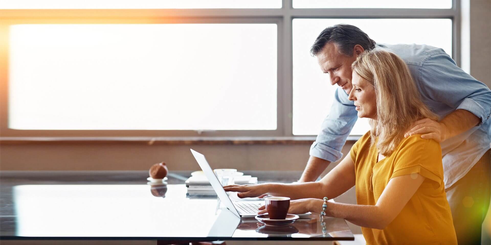 A couple on their laptop